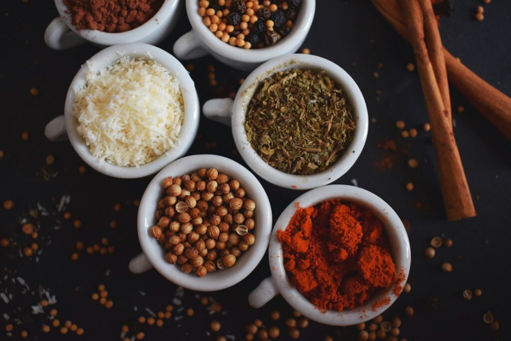 Bowls of digestive spices, for an article on Ayurveda for IBS