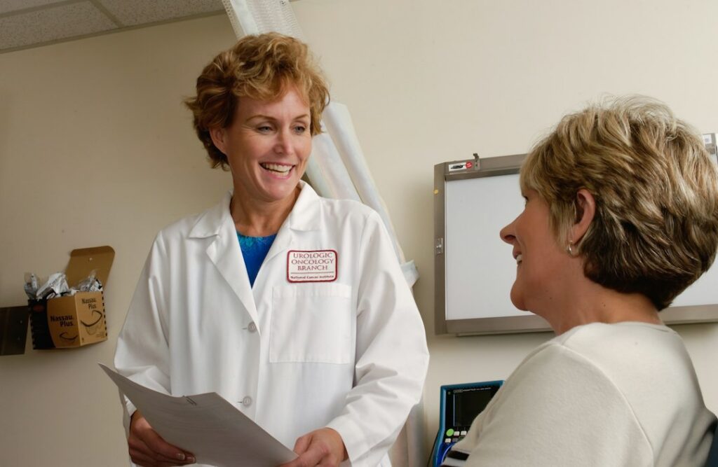 Doctor and patient in a consultation, discussing IBS vs IBD